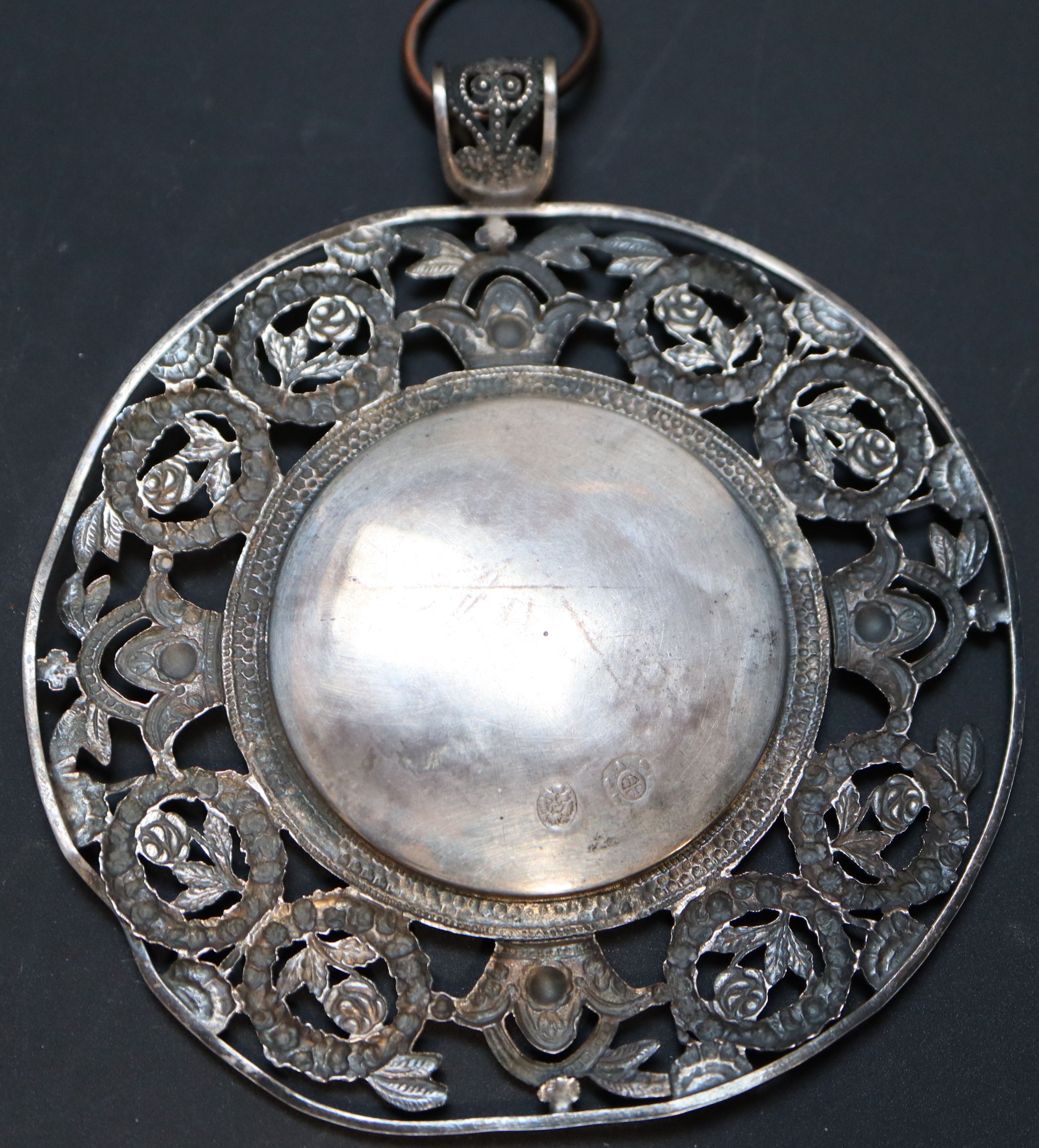 A mid 19th century Austro-Hungarian silver framed enamel plaque, plaque 4cm diameter, frame 8.5cm diameter